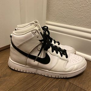 White Nike high tops with black check